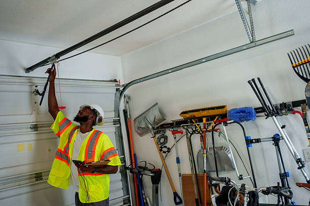 Professional Garage Door Roller Replacement technician working in Harper, KS
